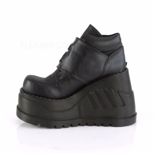 Product image of Demonia STOMP-15 Black Vegan Faux Leather 4 3/4 inch Wedge Platform Bootie With Snap Buckles Detail